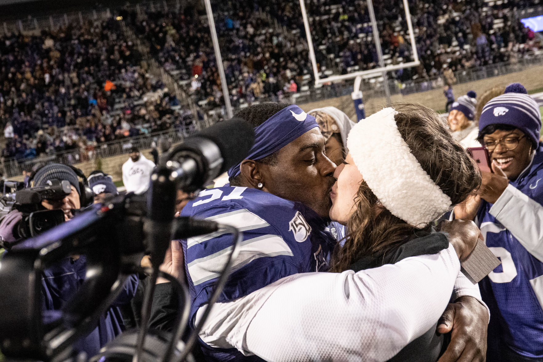 Reggie Walker (51) kisses his fiancee, Calista Hickman